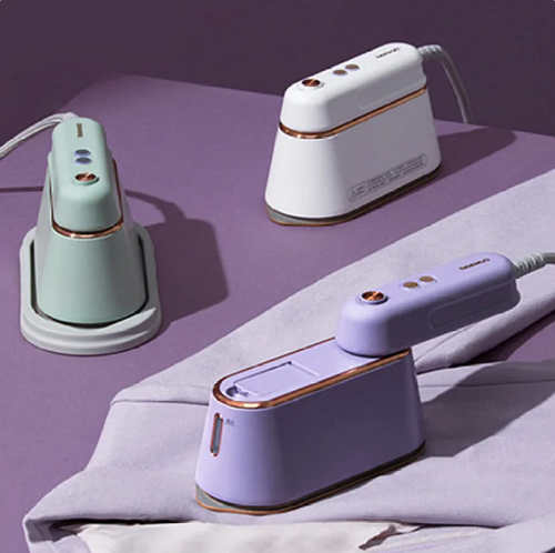TravelPro Handheld Steamer – Sleek & Portable