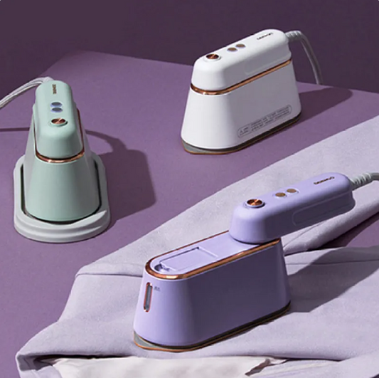 TravelPro Handheld Steamer – Sleek & Portable